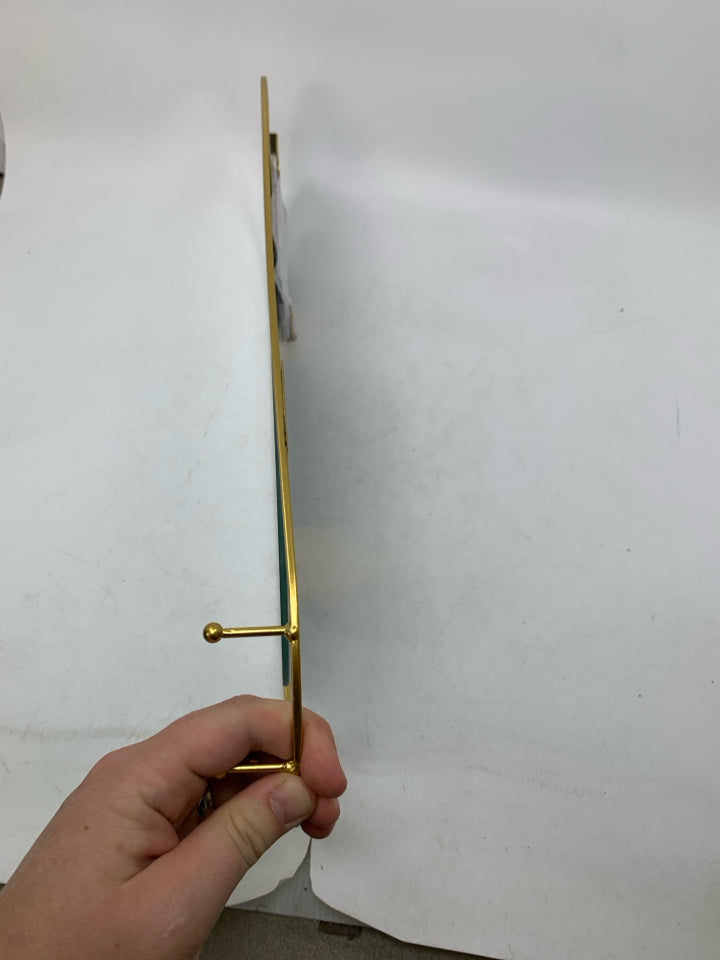 SMALL OVAL MIRROR W/ HOOKS.