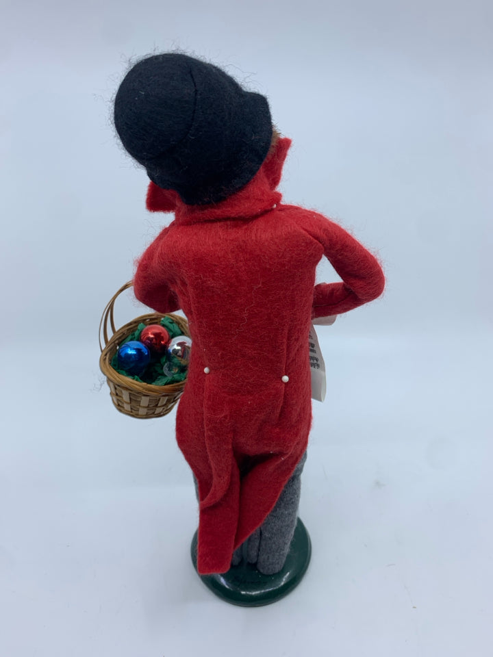 1997 BYERS CHOICE MAN HOLDING BASKET OF ORNAMENTS.