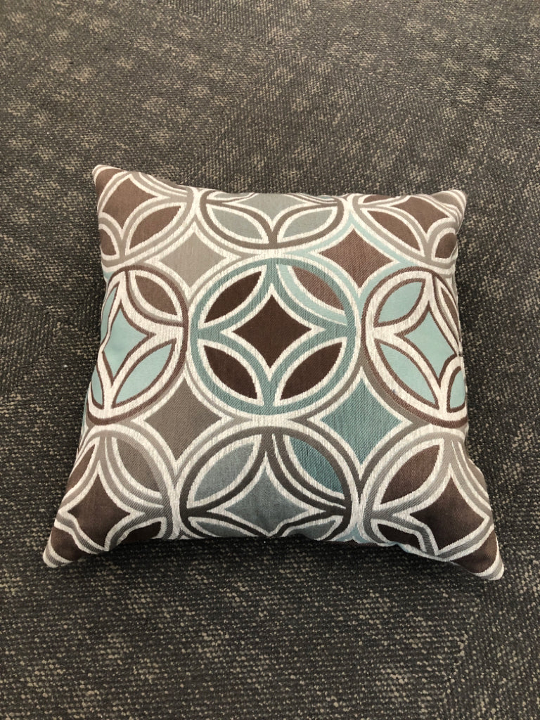BLUE/BROWN CIRCLE DESIGN PILLOW.
