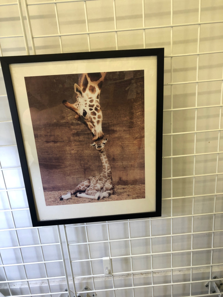 GIRAFFE WITH BABY IN BLACK FRAME WALL HANGING.