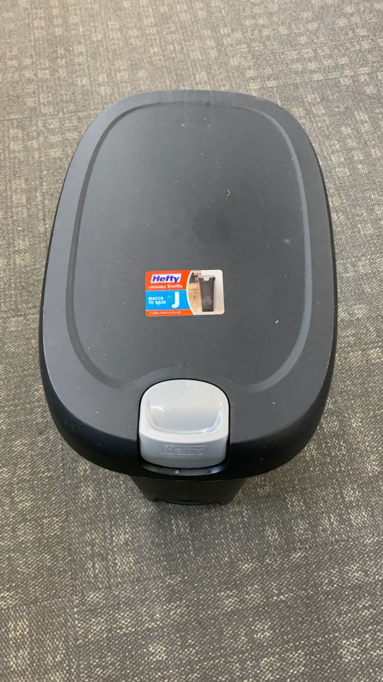 NEW HEFTY BLACK PLASTIC TRASH BARREL W/FLIP LID.
