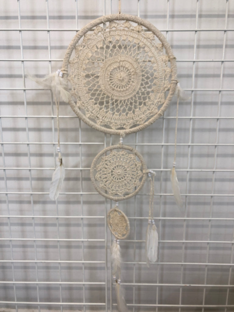 WHITE WOVEN DREAM CATCHER.