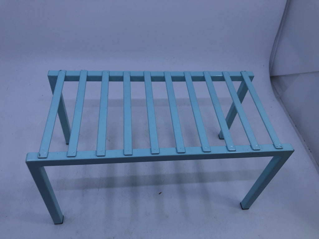 LIGHT BLUE CABINET STORAGE RISER.