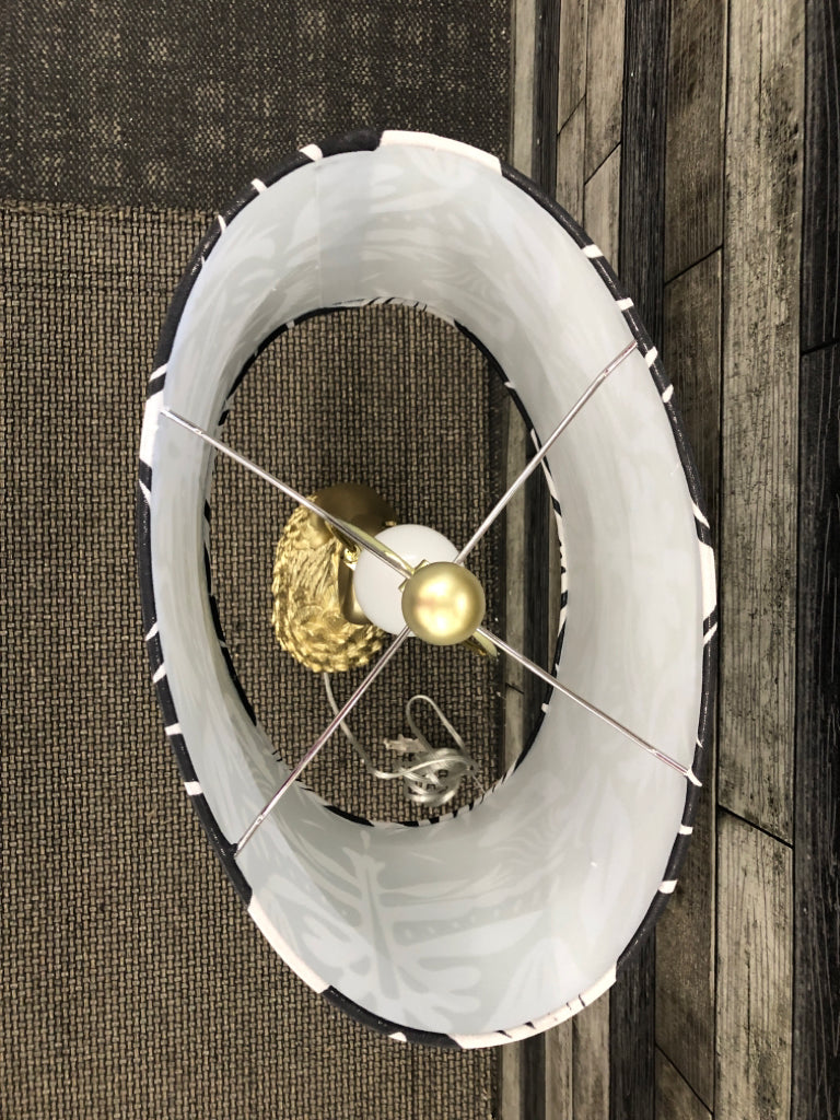 GOLD SWAN BASE LAMP, BLACK AND WHITE SHADE.
