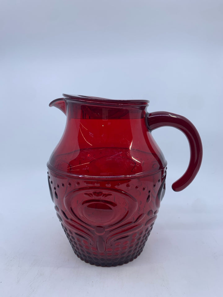 RED EMBOSSED PLASTIC PITCHER.