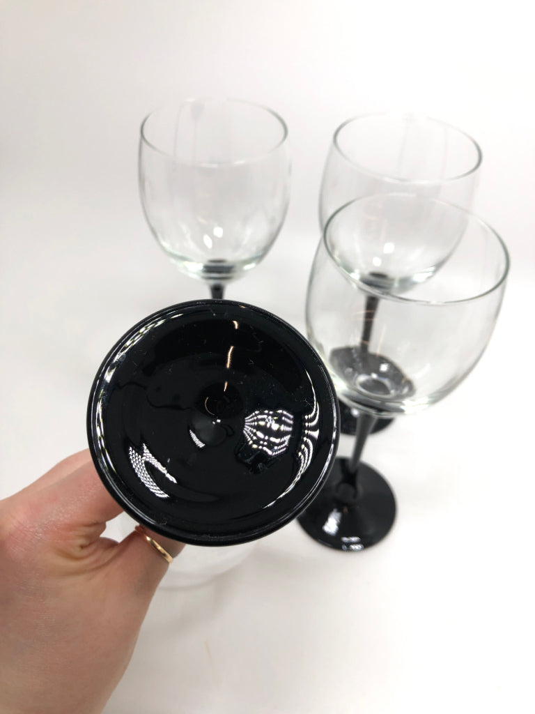 4 BLACK STEMMED WINE GLASSES MADE IN FRANCE.