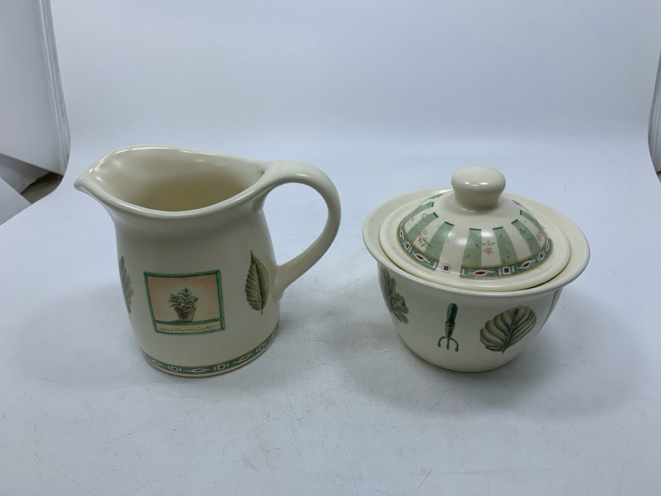 2 PC CREAMER/SUGAR BOWL GARDEN THEMED.