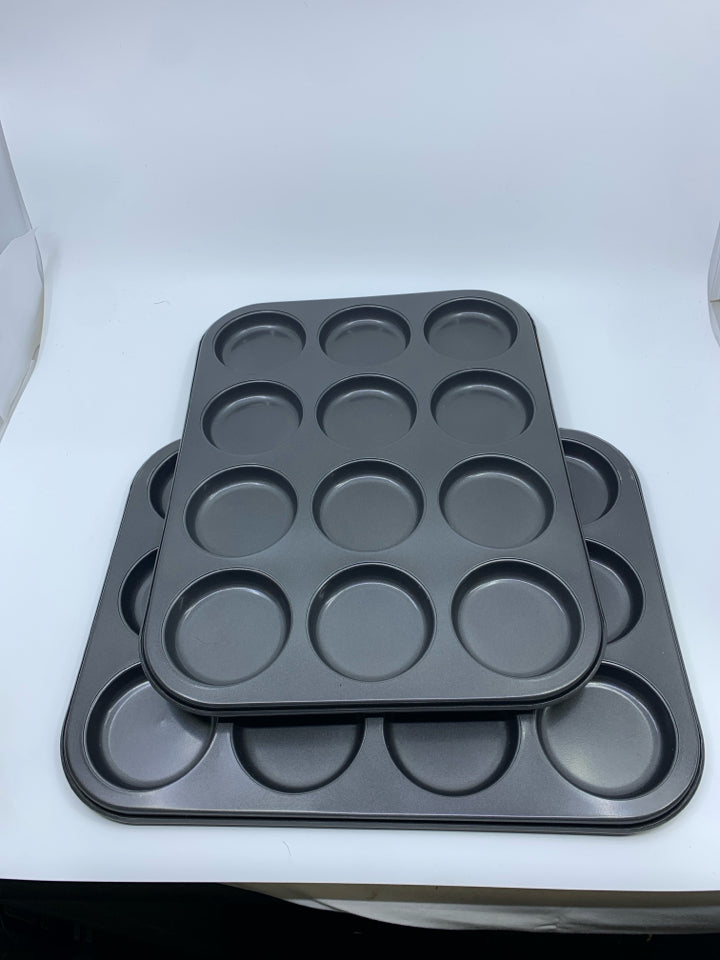 2 GREY MUFFIN TOP PANS.