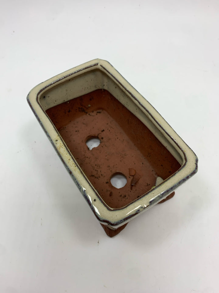 TAN GLAZED TERRACOTTA PLANTER.