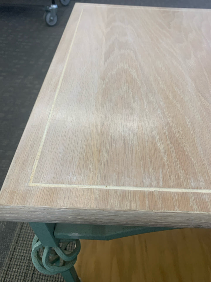 GREEN METAL & BLONDE WOOD TABLE.