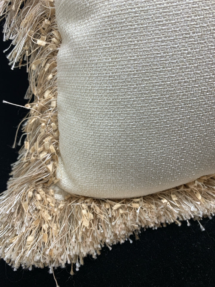 CREAM PILLOW W/TAN TASSEL FRINGE.