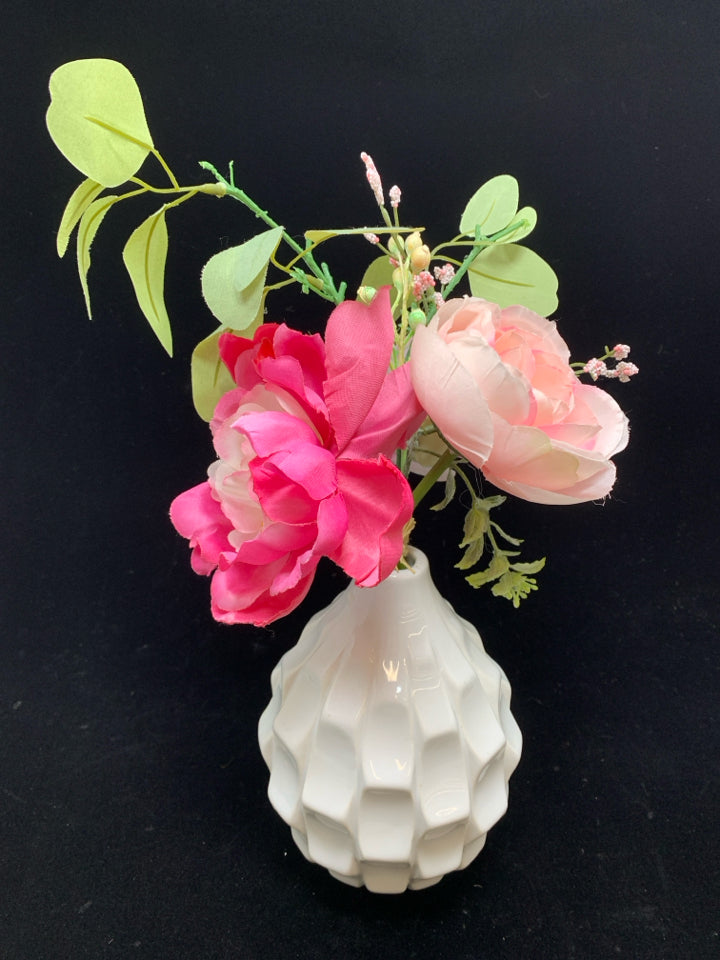 FAUX PINK FLORALS IN WHITE ROUND CERAMIC VASE.