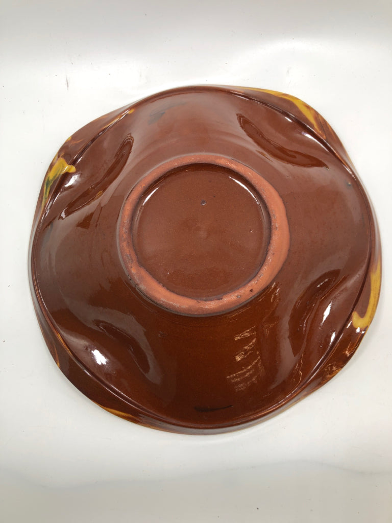 YELLOW SWIRL GLAZE POTTERY BOWL.