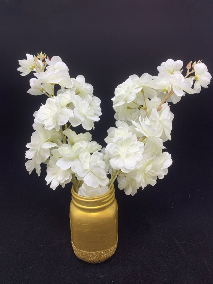 FAUX WHITE FLOWERS IN GOLD SPARKLE MASON JAR.