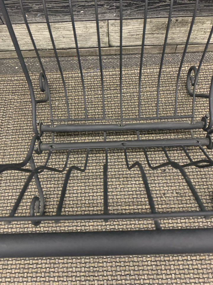 BLACK METAL LOG HOLDER.