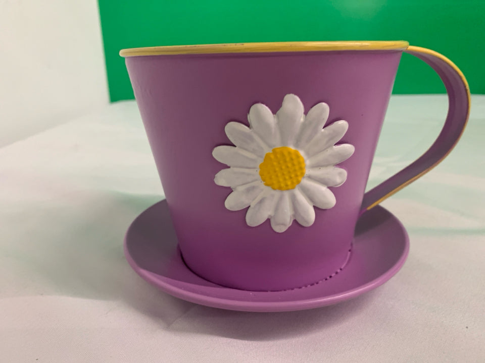 PURPLE AND YELLOW FLORAL PLANTER.