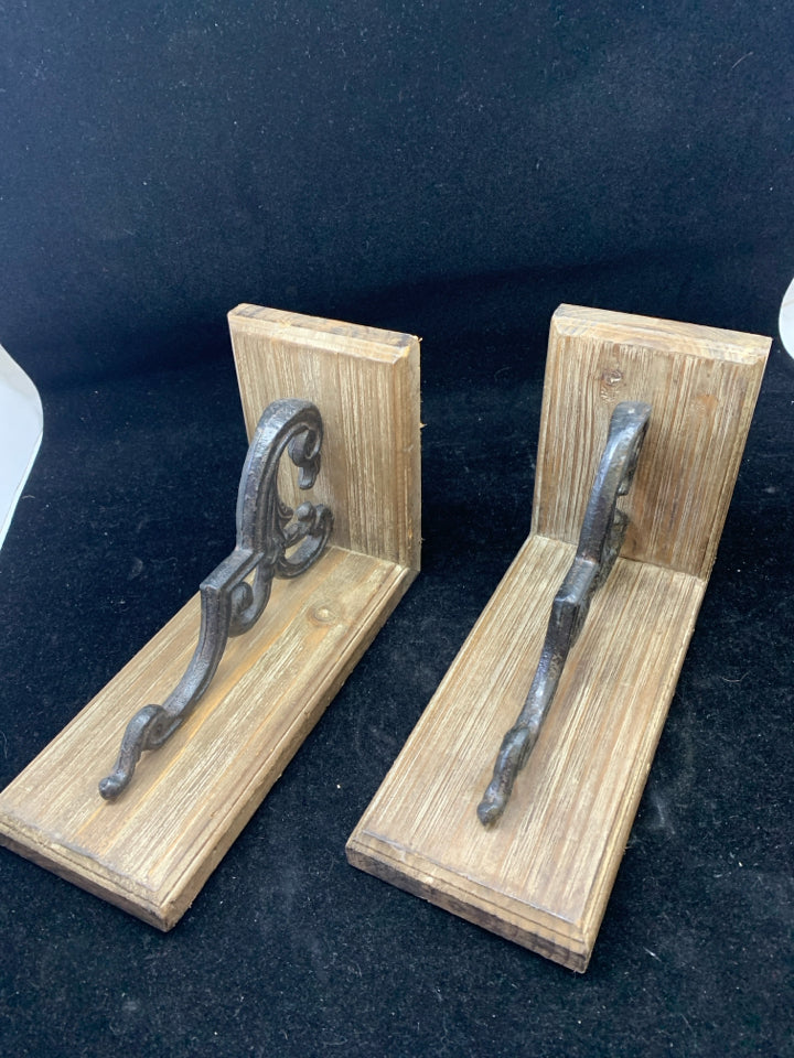 2 DARK WOOD BOOKENDS W/ METAL SCROLL.