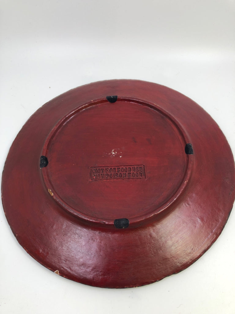 PRIMITIVE WOOD DECORATIVE PLATE RED W/GOLD AND BLACK ACCENTS.