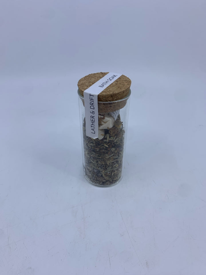 NIP LATHER AND DRIFT BATH SOAK.