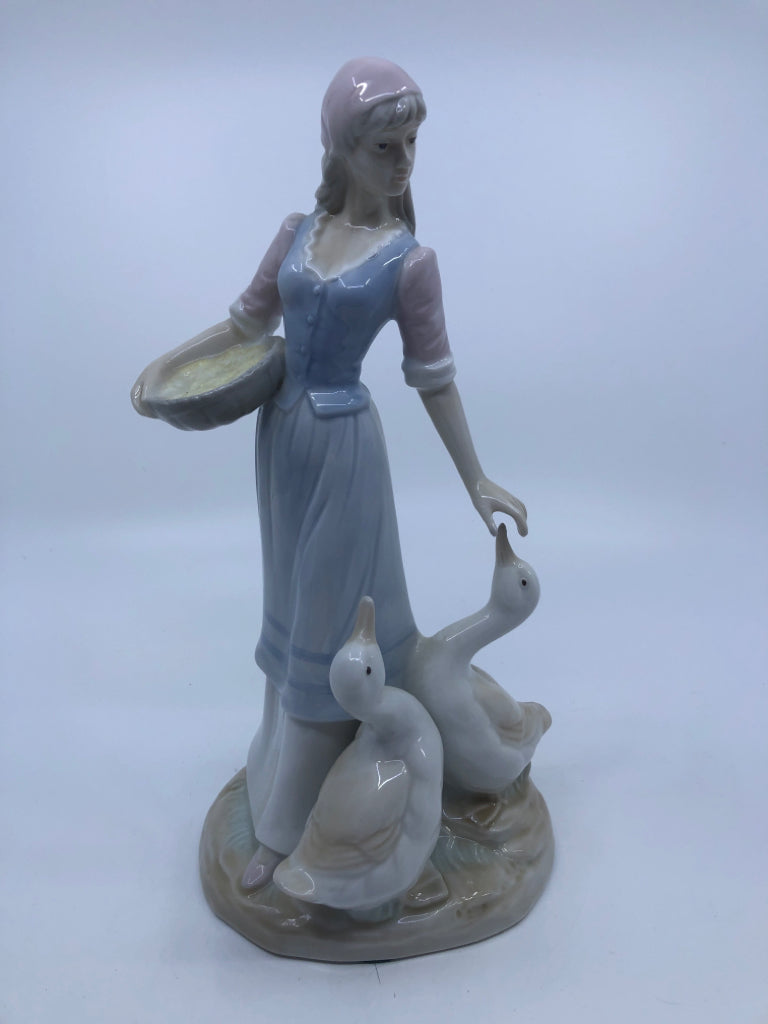 GIRL FEEDING GEESE PORCELAIN FIGURINE.