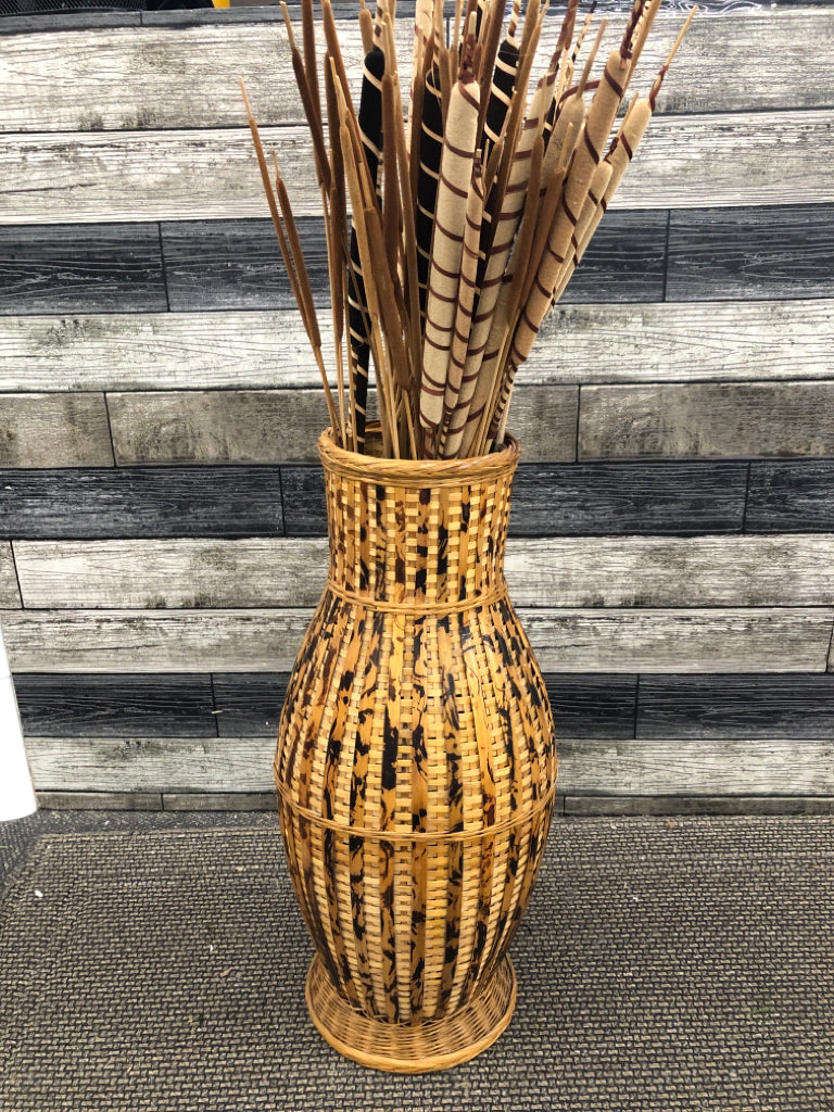 FAUX CAT TAILS IN WOVEN BASKET FLOOR VASE.