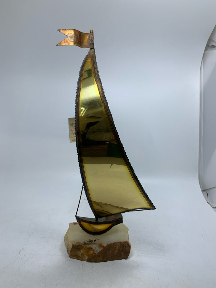 VTG BRASS SAIL BOAT ON ROCK SLAB SIGNED DEMOTT W/ TAGS.