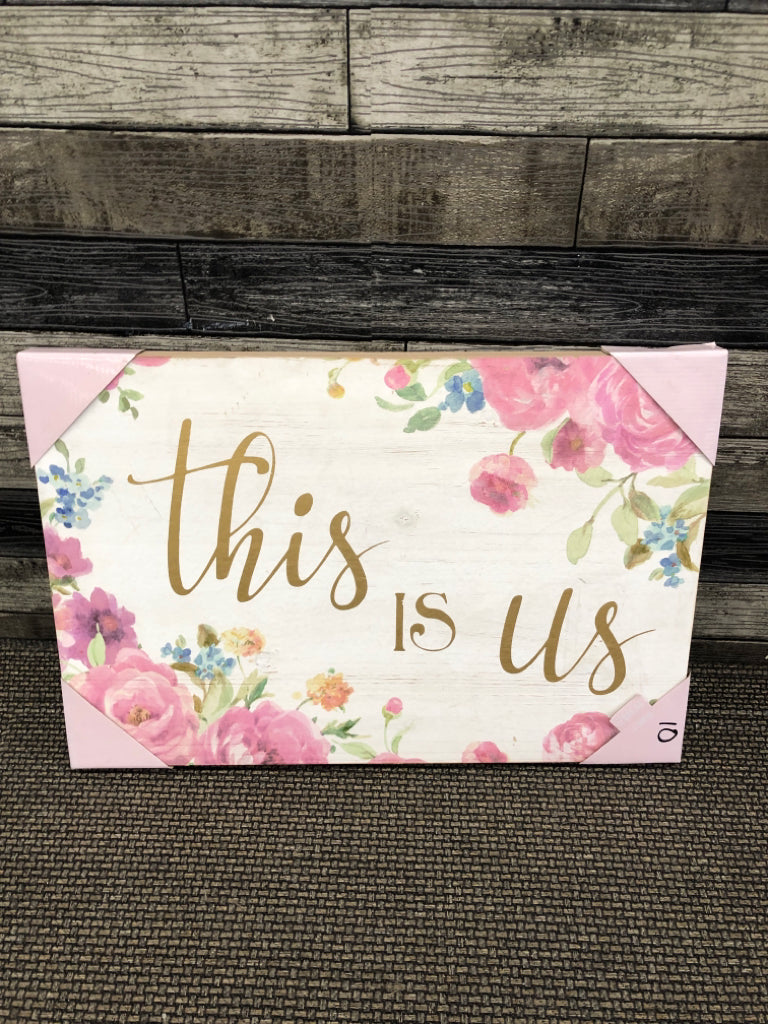 NIP THIS IS US WALL DECOR.