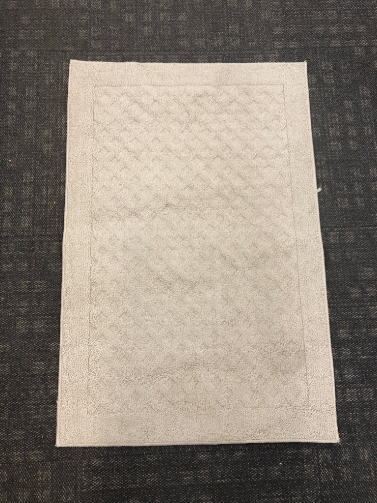 TAN RUG.
