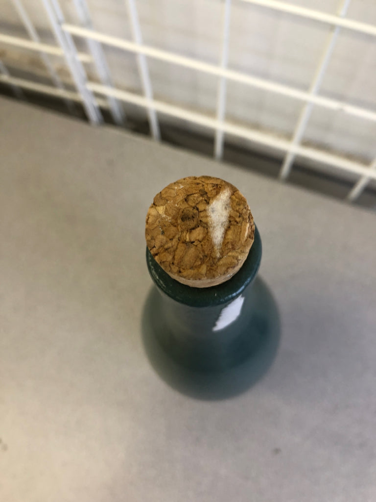 GREEN PORCELAIN BOTTLE WITH CORK.