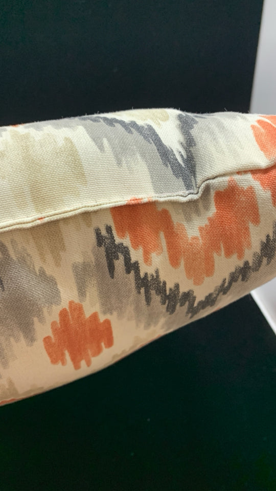 ORANGE ARROW DESIGN PILLOW.