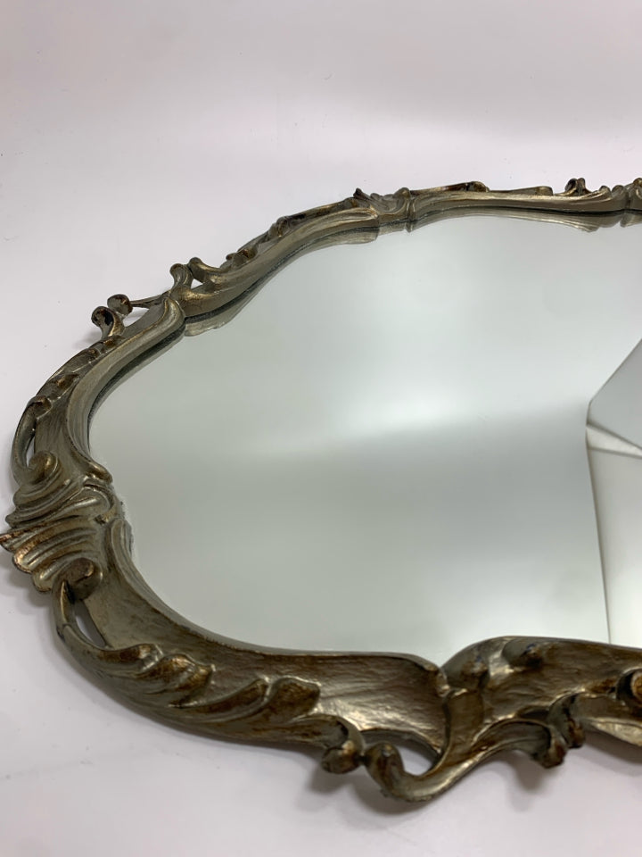 ORNATE SILVER FRAMED OVAL MIRROR.