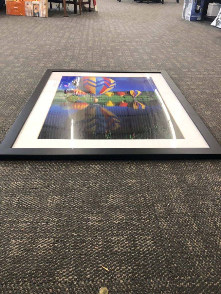 COLORFUL HOT AIR BALLOONS OVER WATER WALL ART BLACK FRAME.