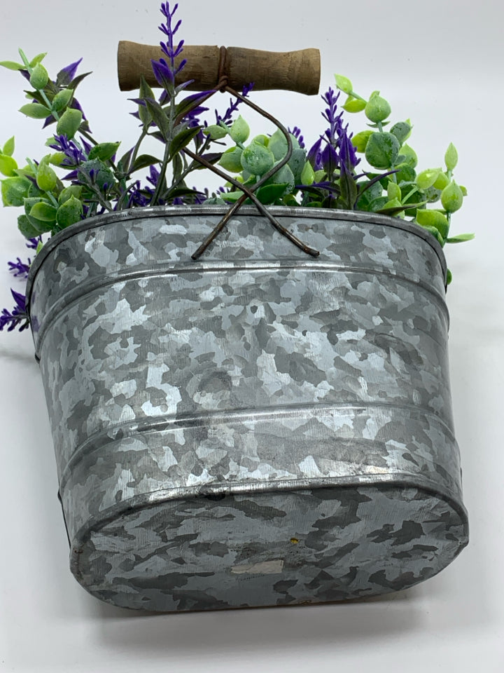 FAUX LAVENDER IN GALVANIZED BUCKET.