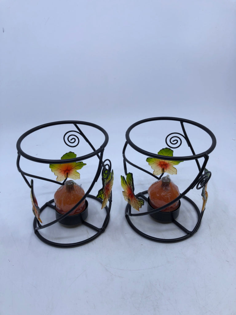 2 BLACK METAL LEAF CANDLE HOLDERS W PUMPKIN TEA LIGHTS.