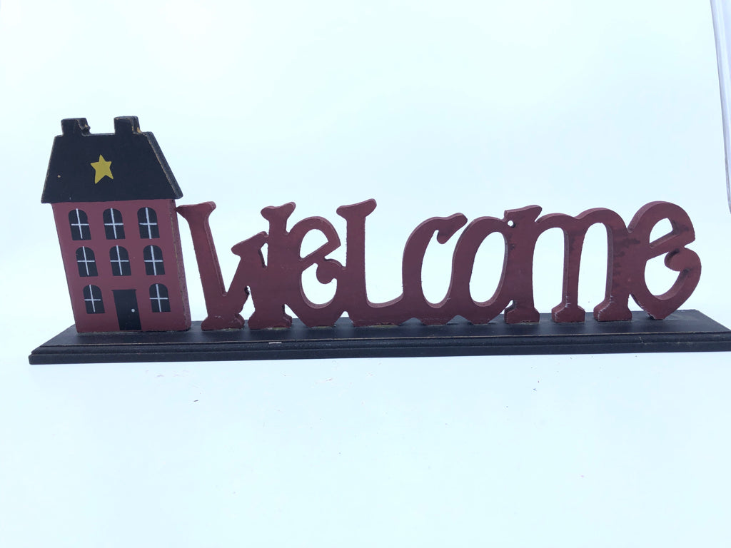 PRIMITIVE RED WELCOME STANDING SIGN.