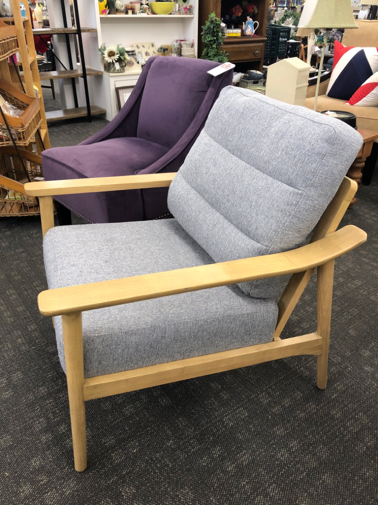 TAN CHAIR W/ GREY CUSHION.