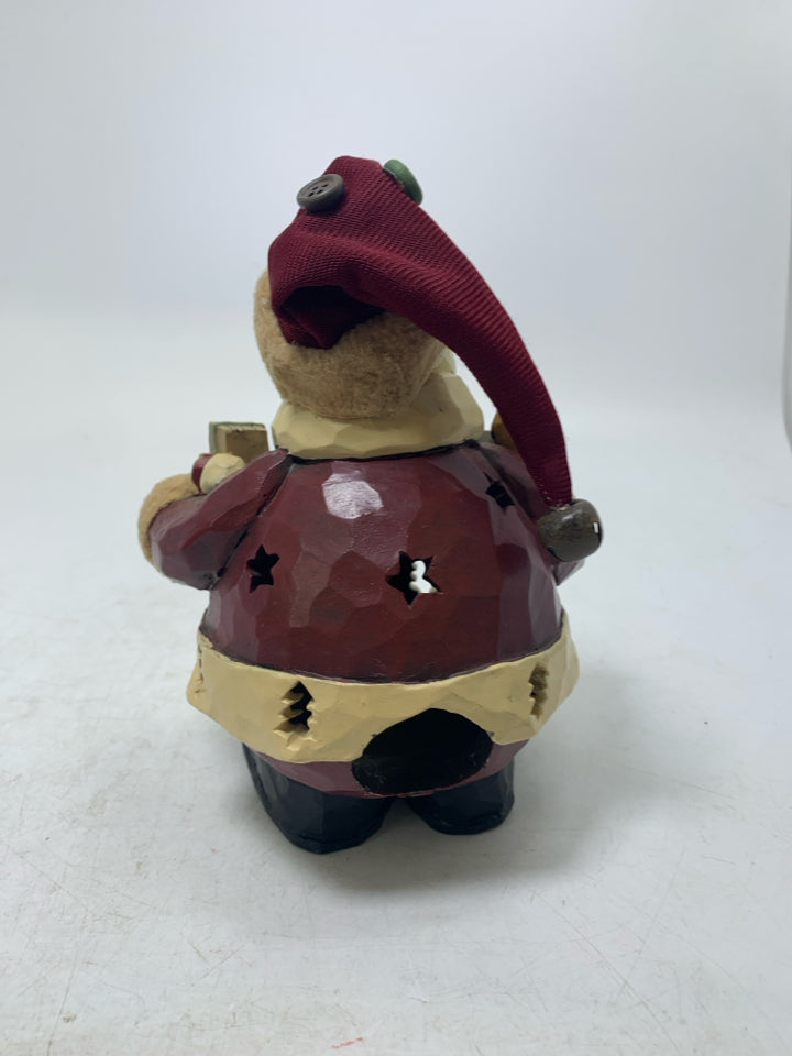 PRIMITIVE STYLE SANTA HOLDING PRESENT PIERCED TEA LIGHT HOLDER RESIN.