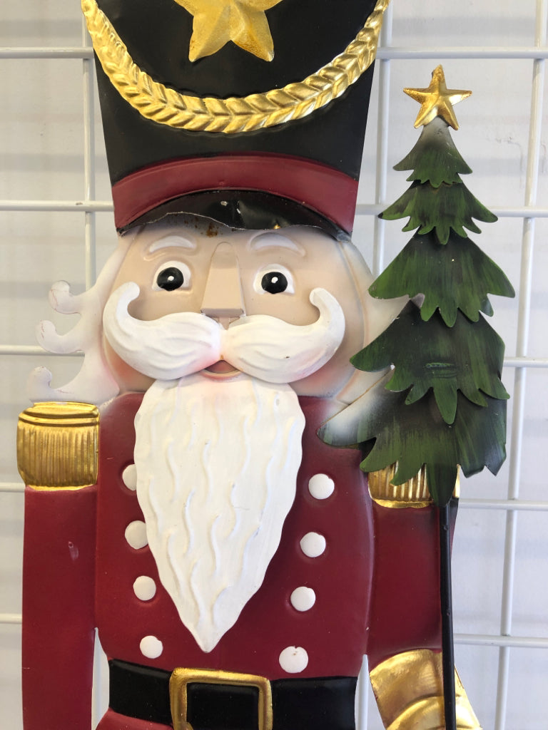 METAL NUTCRACKER YARD STAKE SIGN.