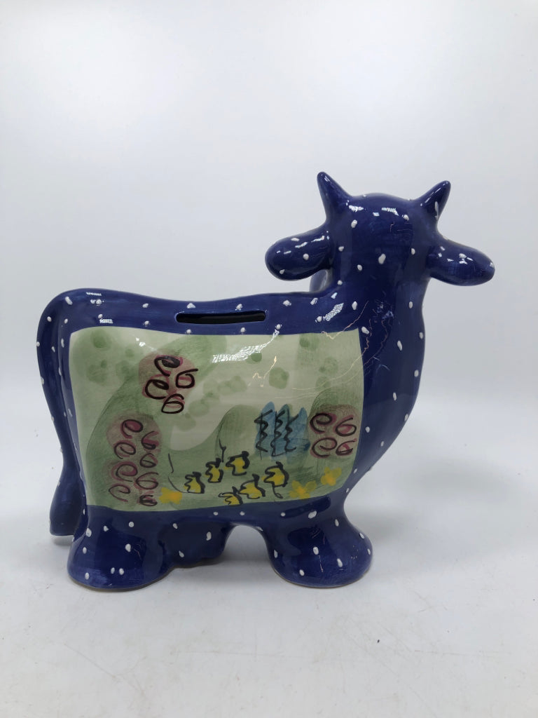 CERAMIC BLUE COW PIGGY BANK.