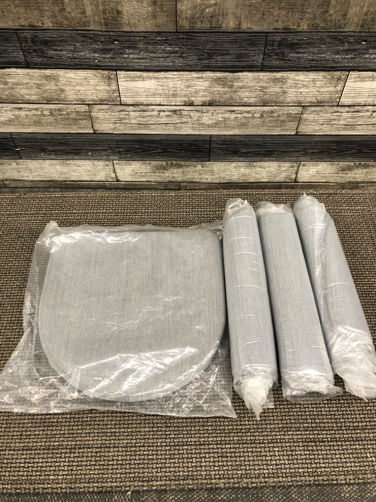 NIP 4PC ROLLED-UP GRAY SEAT CUSHION.