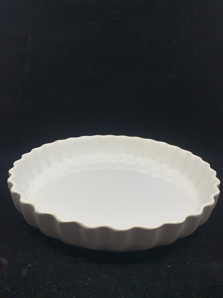 WHITE GLAZED STONEWARE PIE DISH.