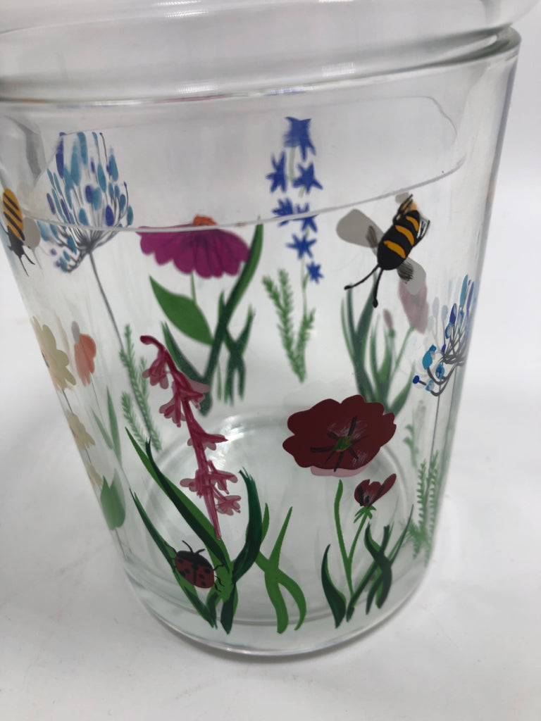 CLEAR JAR W/ PAINTED FLOWERS AND BEES.