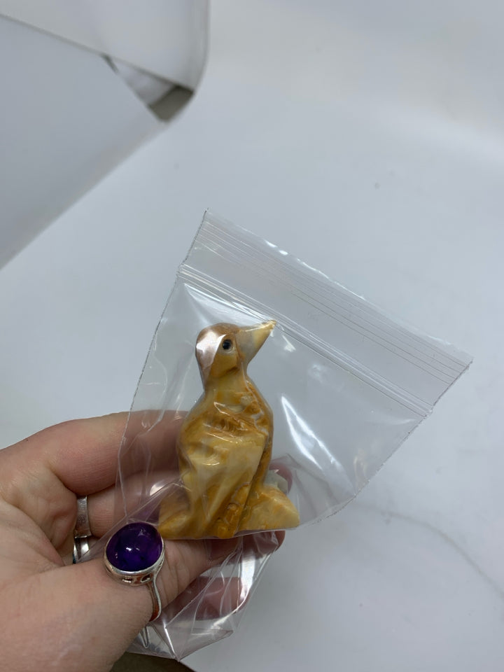 STONE CARVED PENGUIN/BIRD IN BAG.