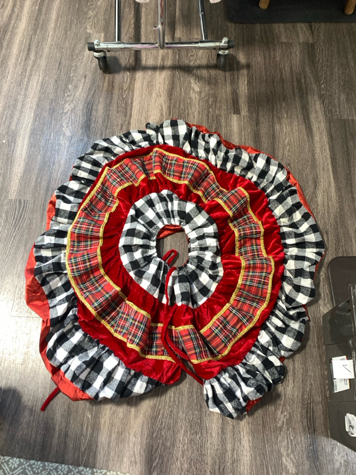 RED VELOUR W/ BUFFALO PLAID RUFFLED TREE SKIRT.