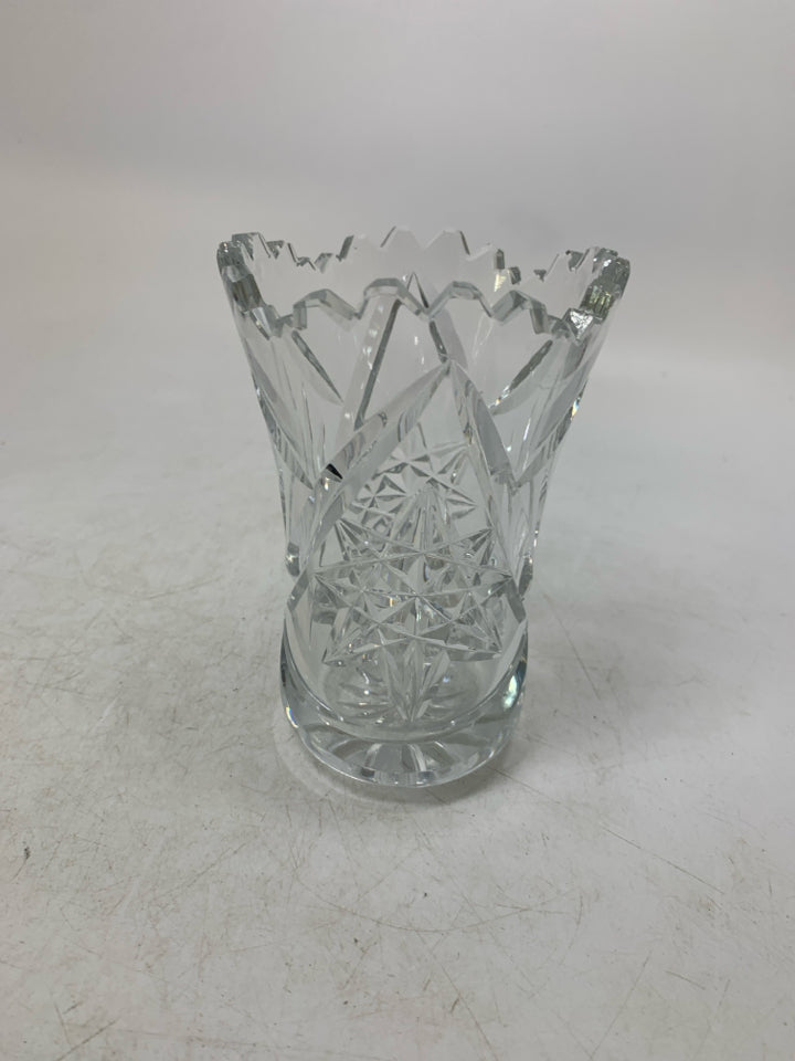 HEAVY BOTTOM STAR PATTERN CRYSTAL VASE W/ UNEVEN TOP.