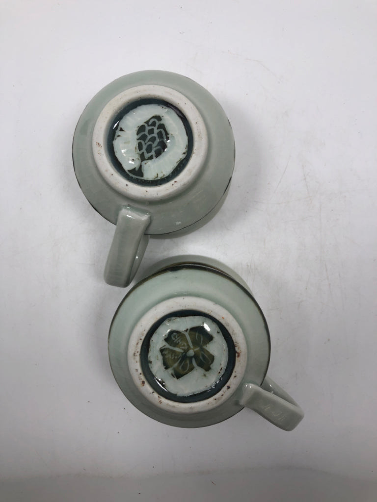 2 FLOWER/ACORN ETCHED DEMITASSE MUGS.