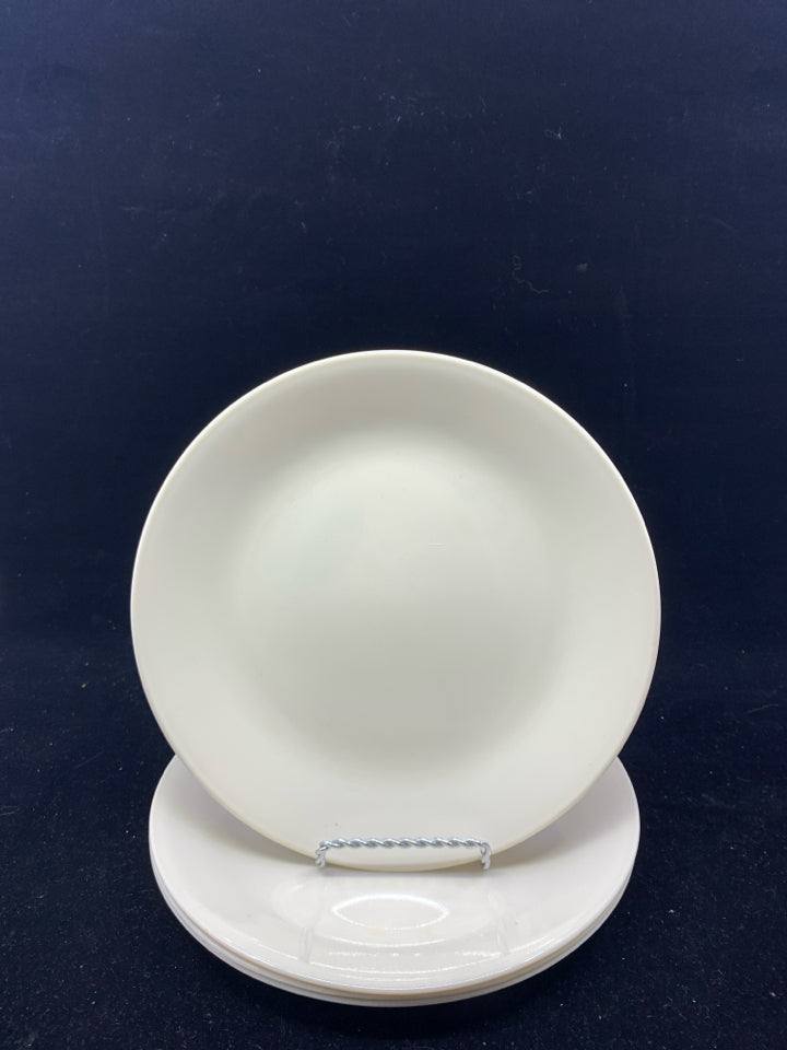 4 TAN CORELLE LUNCH PLATES.