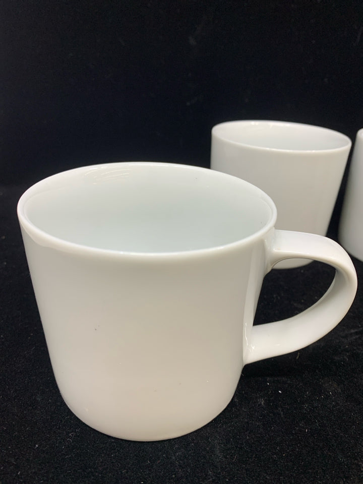 4 WHITE CRATE AND BARREL COFFEE CUPS.