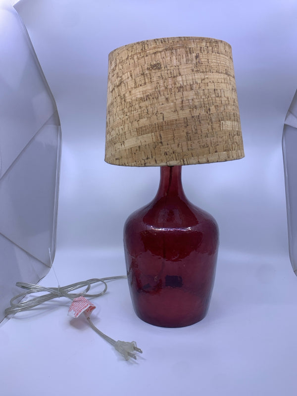BROWN GLASS LAMP WITH CORK SHADE.