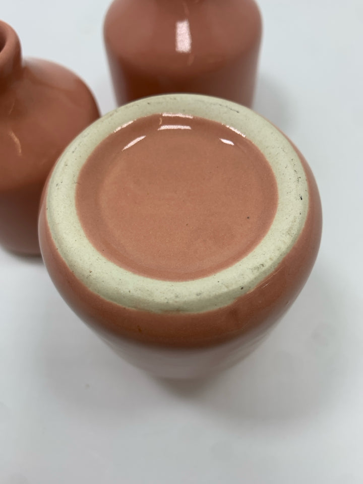 3 PEACH CERAMIC MINI BUD VASES.